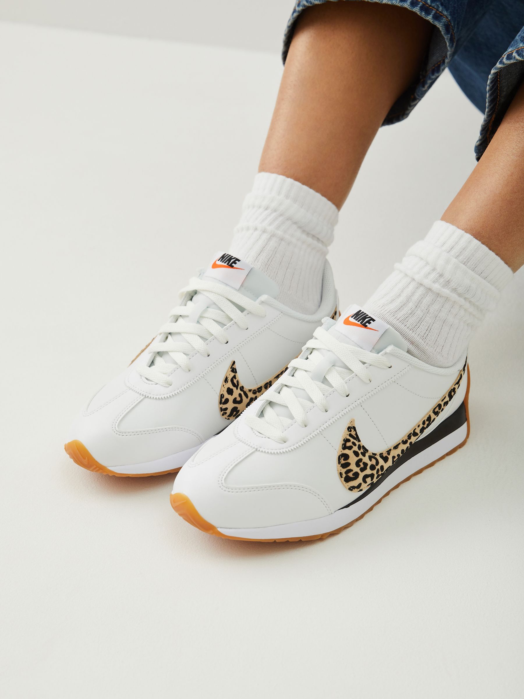 cheetah white nikes