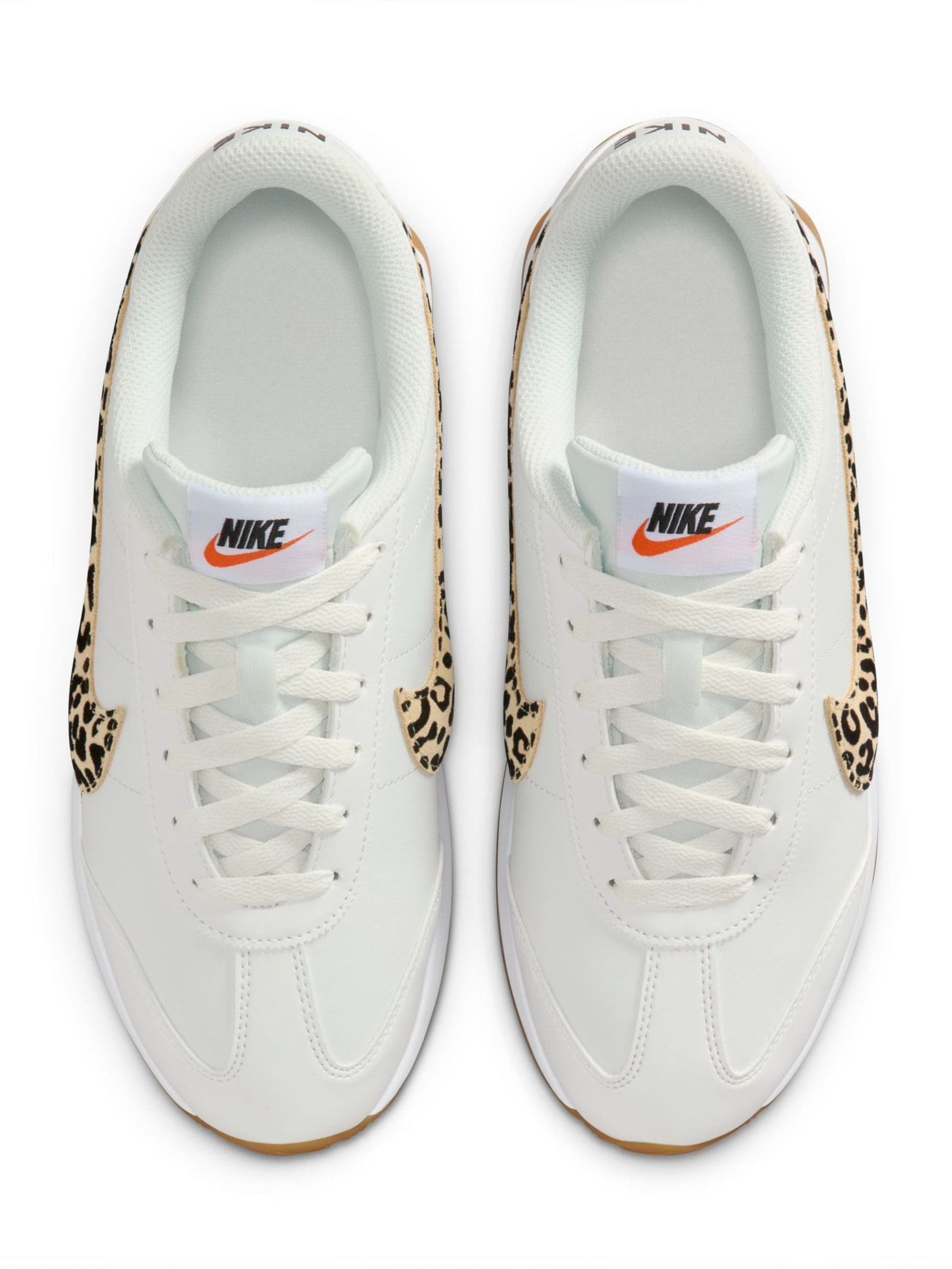 white leopard nike shoes