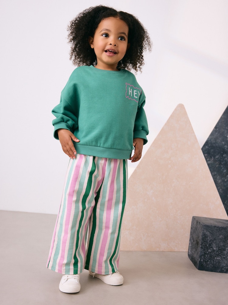 Green Hey Hi Sweatshirt & Wide Leg Trousers Set (3mths-7yrs) - Image 1 of 10 Green Hey Hi Sweatshirt & Wide Leg Trousers Set (3mths-7yrs) - Image 1 of 10