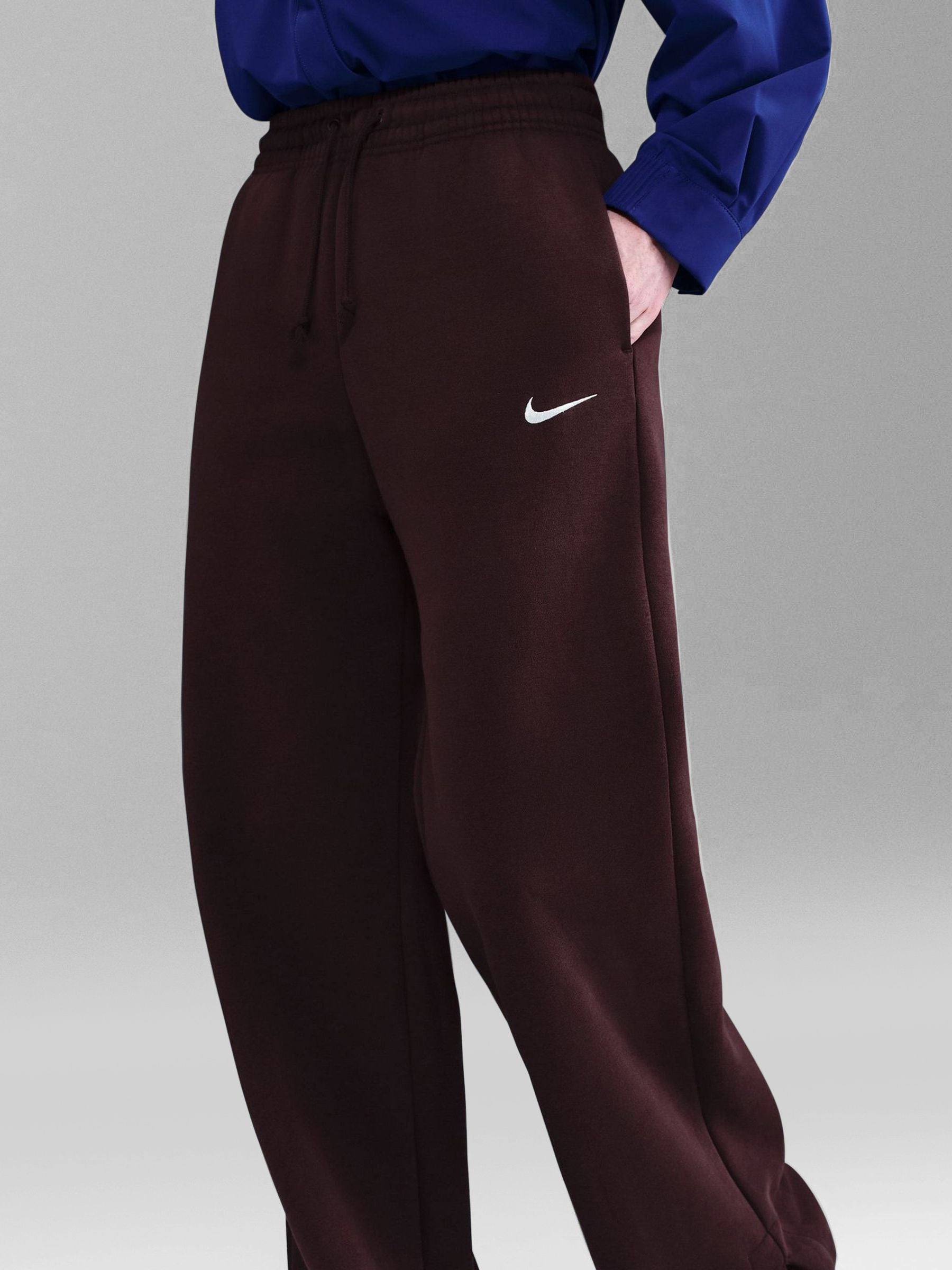 nike mini swoosh high waisted wide leg joggers in red
