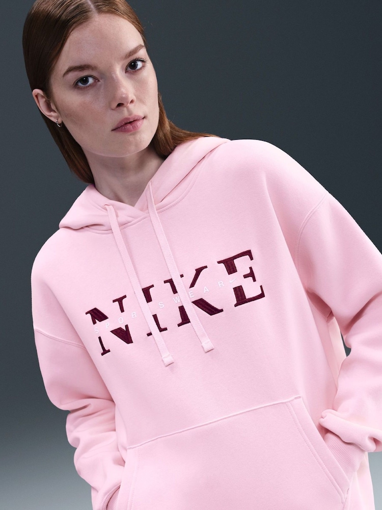 Nike Red Oversized Phoenix Fleece Graphic Logo Hoodie - Image 1 of 10 Nike Red Oversized Phoenix Fleece Graphic Logo Hoodie - Image 1 of 10