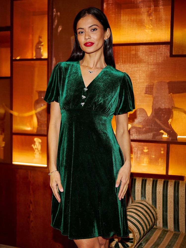 Yumi Green Velvet Skater Dress With Dimante Bow Detail - Image 1 of 5