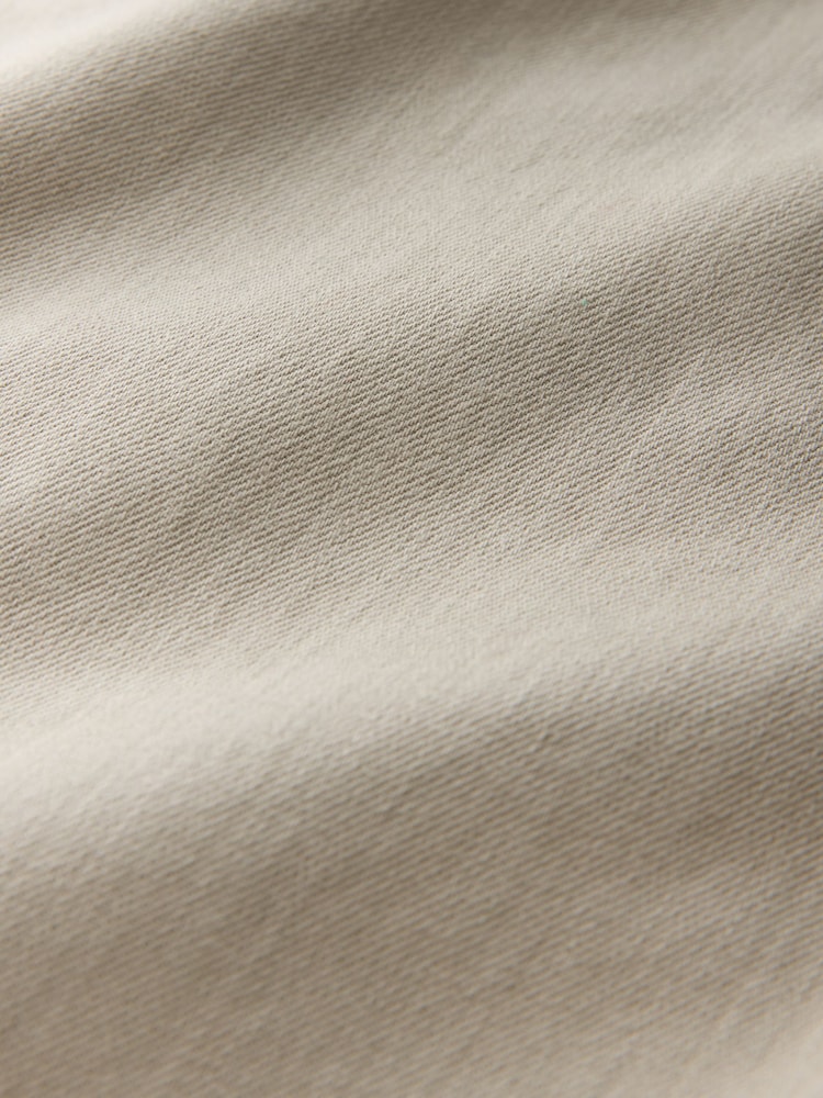 Kredowo-biały - Klasyczne dżinsy o luźnym kroju ze stretchem - Obraz 10 z 10