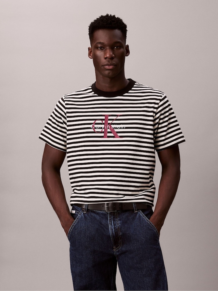 Calvin Klein Black Monogram Logo Stripe Relaxed T-Shirt - Image 1 of 6 Calvin Klein Black Monogram Logo Stripe Relaxed T-Shirt - Image 1 of 6