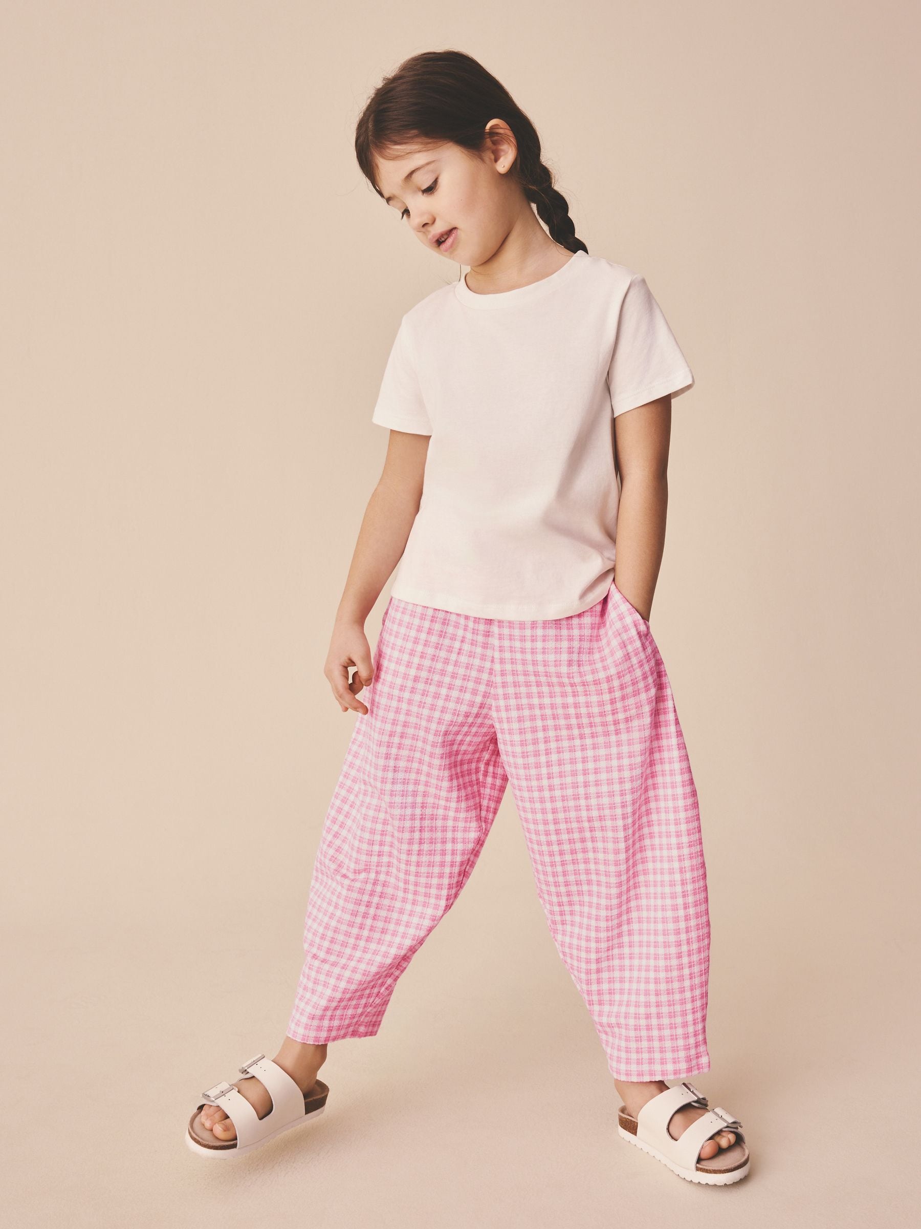 Buy Pink Gingham Textured Barrel Trousers (3-16yrs) from Next USA
