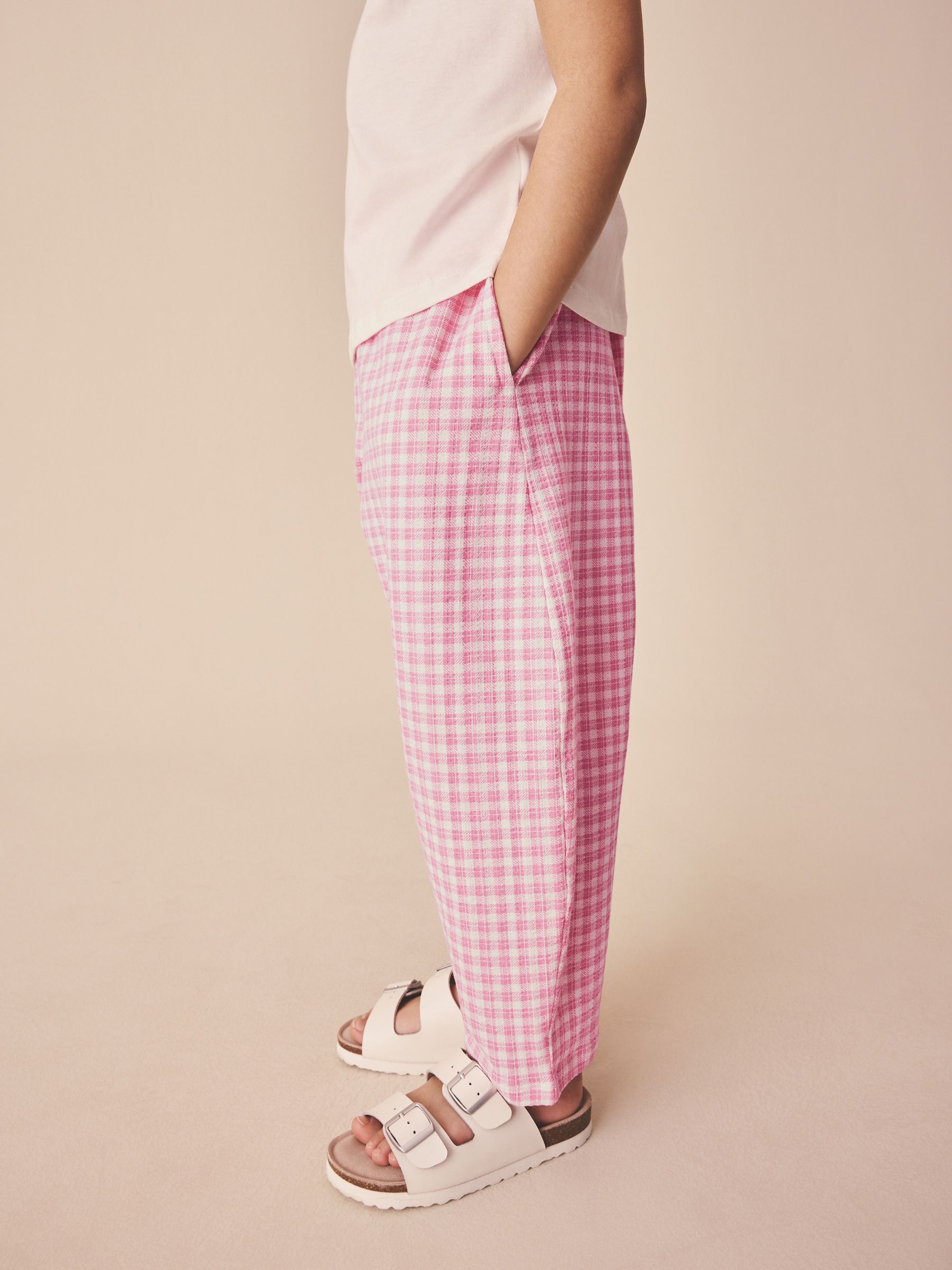Buy Pink Gingham Textured Barrel Trousers (3-16yrs) from Next USA