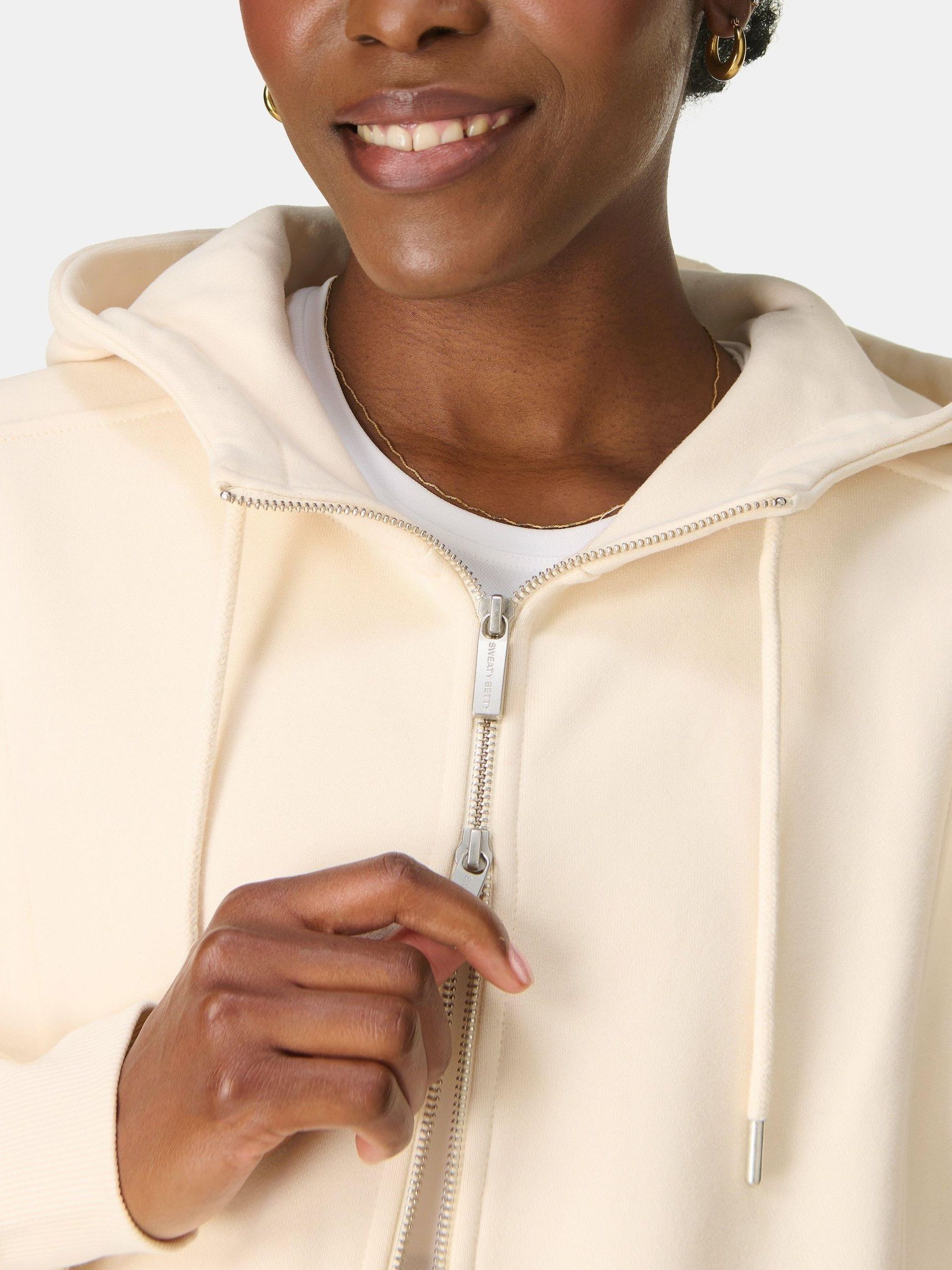 Buy Поза білим - Світшот Sweaty Betty Premium з матовою блискавкою