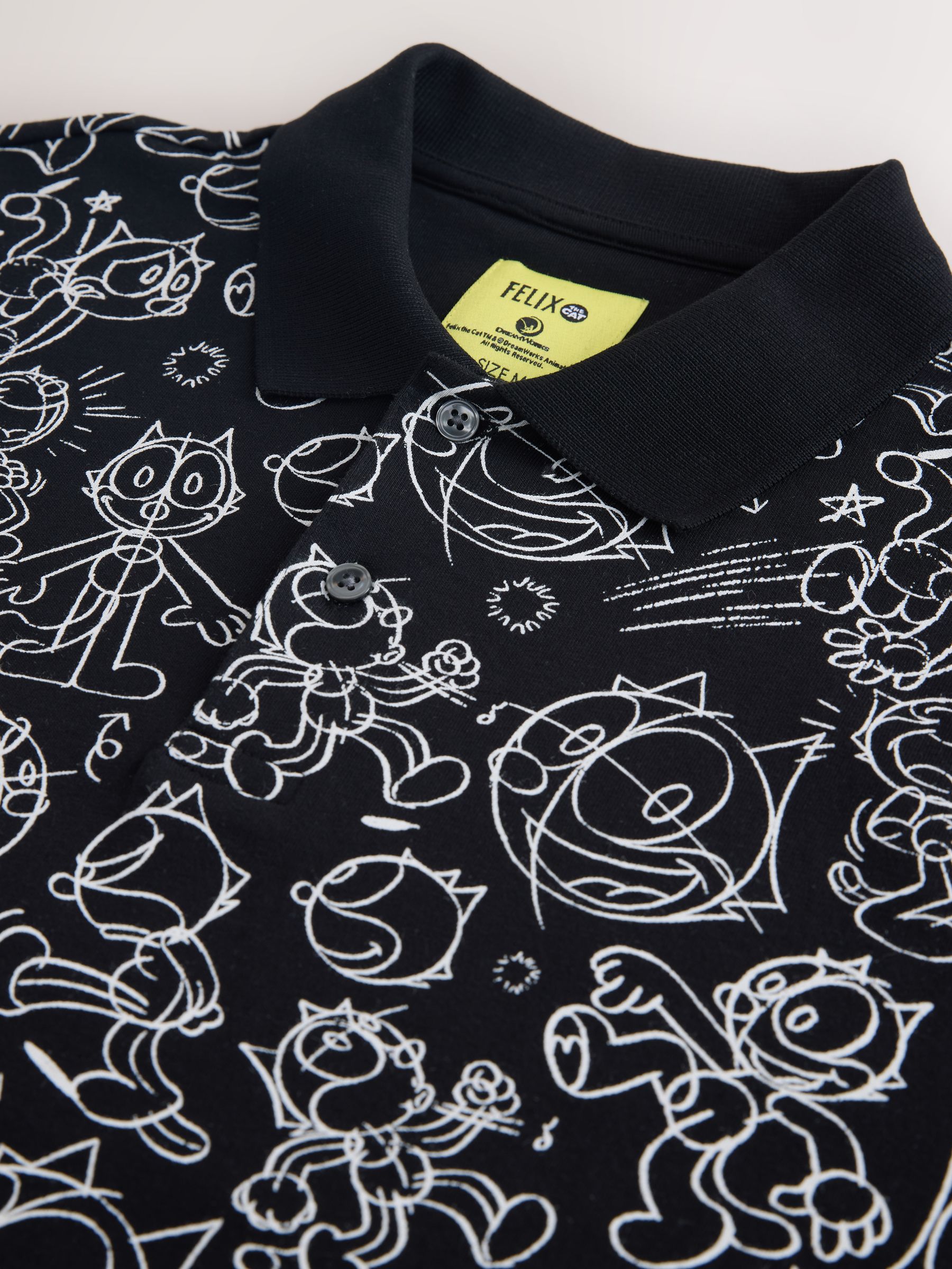 Buy Black/White Felix Short Sleeve Button Neck Pattern Polo Shirt