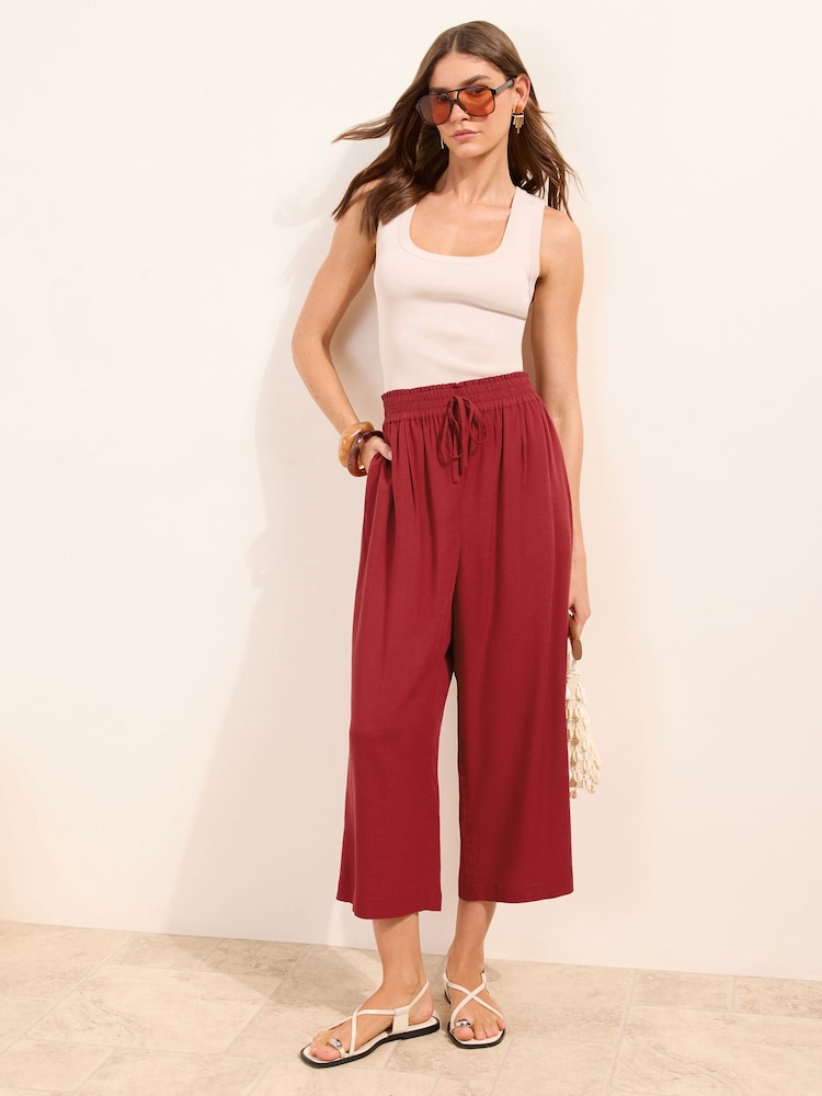 אדום - Friends Like These Cropped Linen Trousers - תמונה 1 מתוך 5