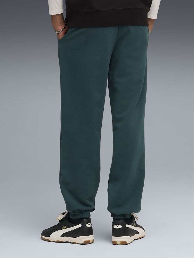 Puma Green Wardrobe Essentials Mens Relaxed Sweatpants - Image 2 of 5 Puma Green Wardrobe Essentials Mens Relaxed Sweatpants - Image 2 of 5