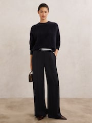 بنطلون Sonnie برجل واسعة بخصر قابل للتمدد من Reiss - صورة 1 من 5