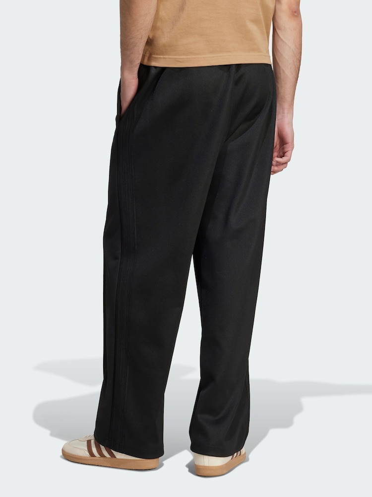 adidas Originals Black Adicolor Baggy Fit Firebird Track Joggers - Image 2 of 5 adidas Originals Black Adicolor Baggy Fit Firebird Track Joggers - Image 2 of 5