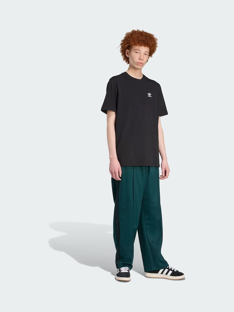 adidas Originals Green Adicolor Baggy Fit Firebird Track Joggers - Image 1 of 5 adidas Originals Green Adicolor Baggy Fit Firebird Track Joggers - Image 1 of 5