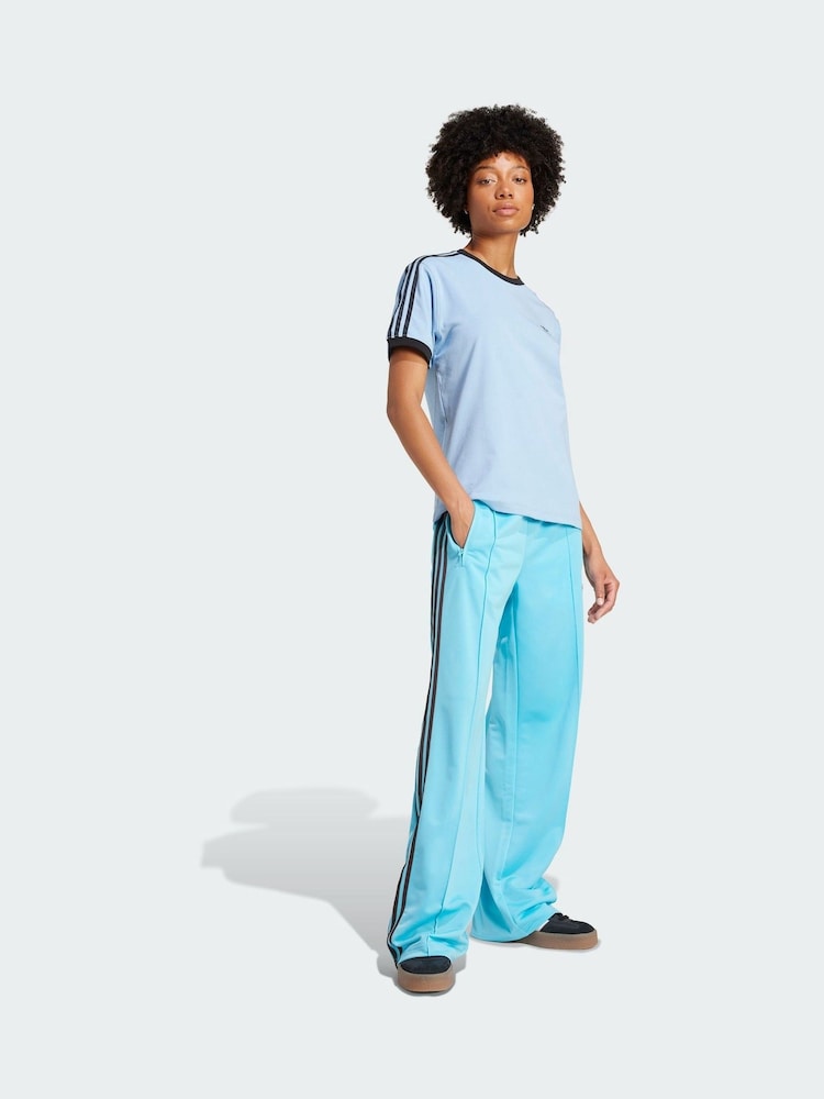 adidas Originals Blue Adicolor Classic Firebird Loose Track Joggers - Image 1 of 5 adidas Originals Blue Adicolor Classic Firebird Loose Track Joggers - Image 1 of 5