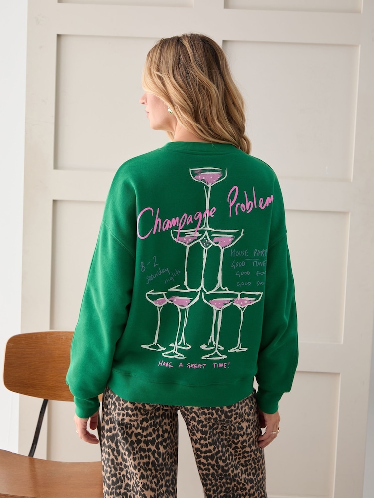 Here for the T Green Champagne Problems Back Print Graphic Oversized Crew Neck Sweatshirt - Image 1 of 5 Here for the T Green Champagne Problems Back Print Graphic Oversized Crew Neck Sweatshirt - Image 1 of 5