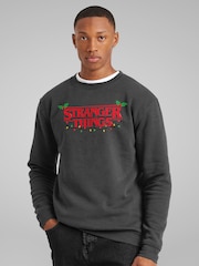 All + Every Grey Stranger Things Christmas Lights & Holly Logo Sweatshirt - Image 1 of 4