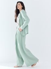 Sage Green Crinkle Fabric Wide Leg Tailored Trousers - Image 1 of 8