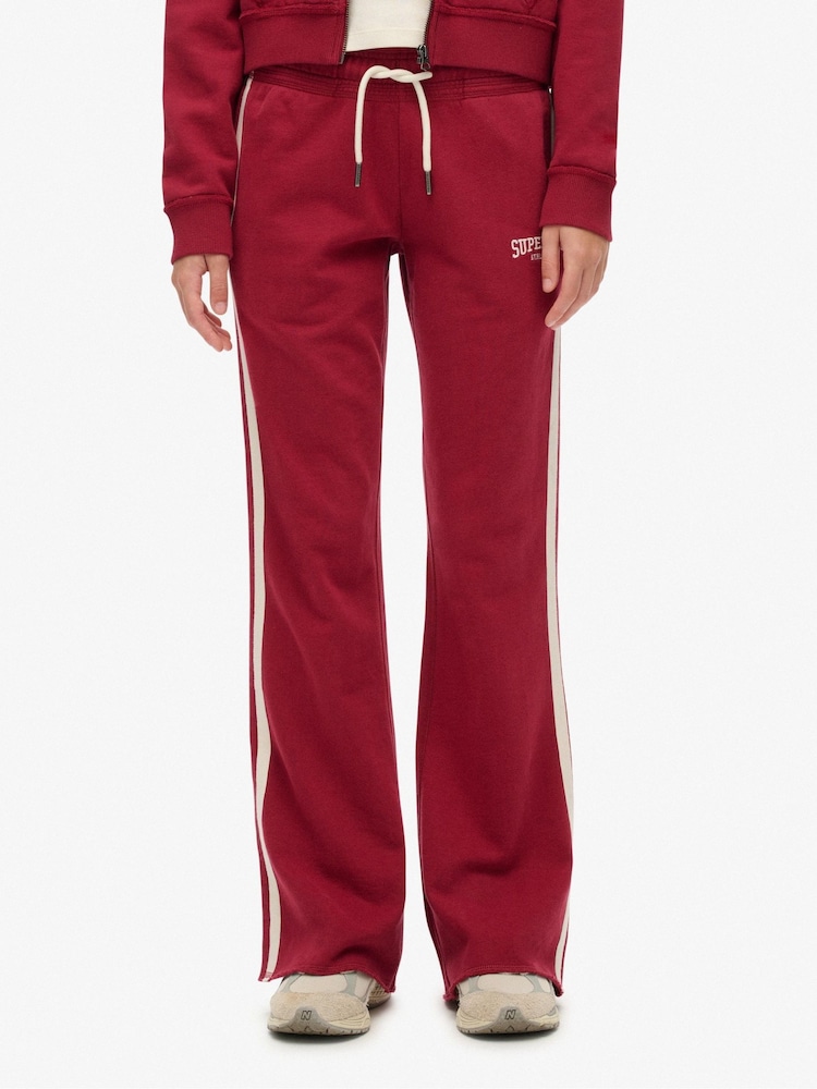 Superdry Red Athletic Stripe Flare Joggers - Image 1 of 8 Superdry Red Athletic Stripe Flare Joggers - Image 1 of 8