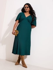 Friends Like These Green Curve Textured Jersey V-Neck Midi Dress - Image 1 of 4