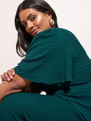 Friends Like These Green Curve Textured Jersey V-Neck Midi Dress - Image 2 of 4