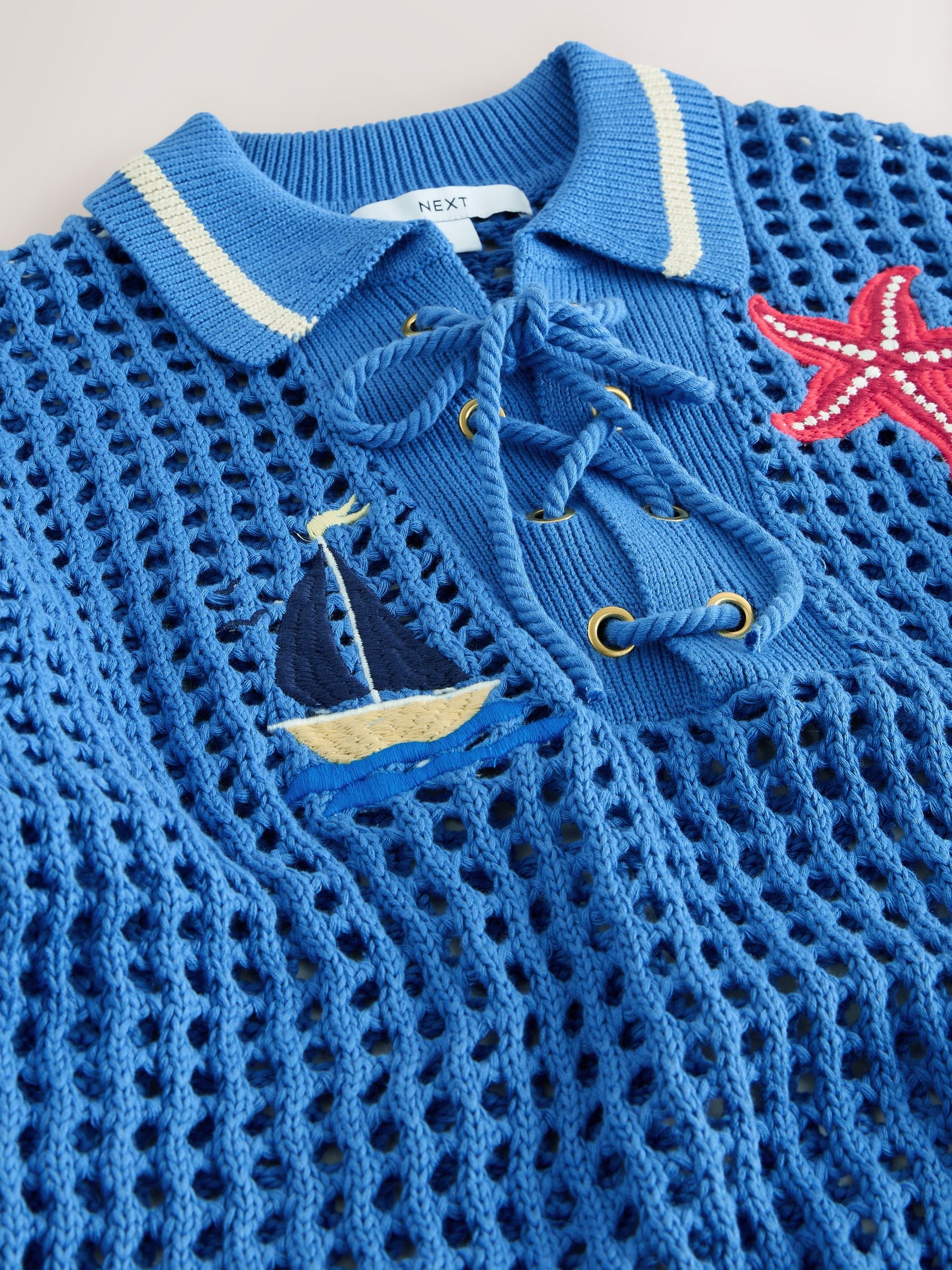CADUNE　裾レースメッシュニット　ライトブルー Next：日本 ブルー 刺繍入り - コットンメッシュニットレースアップ