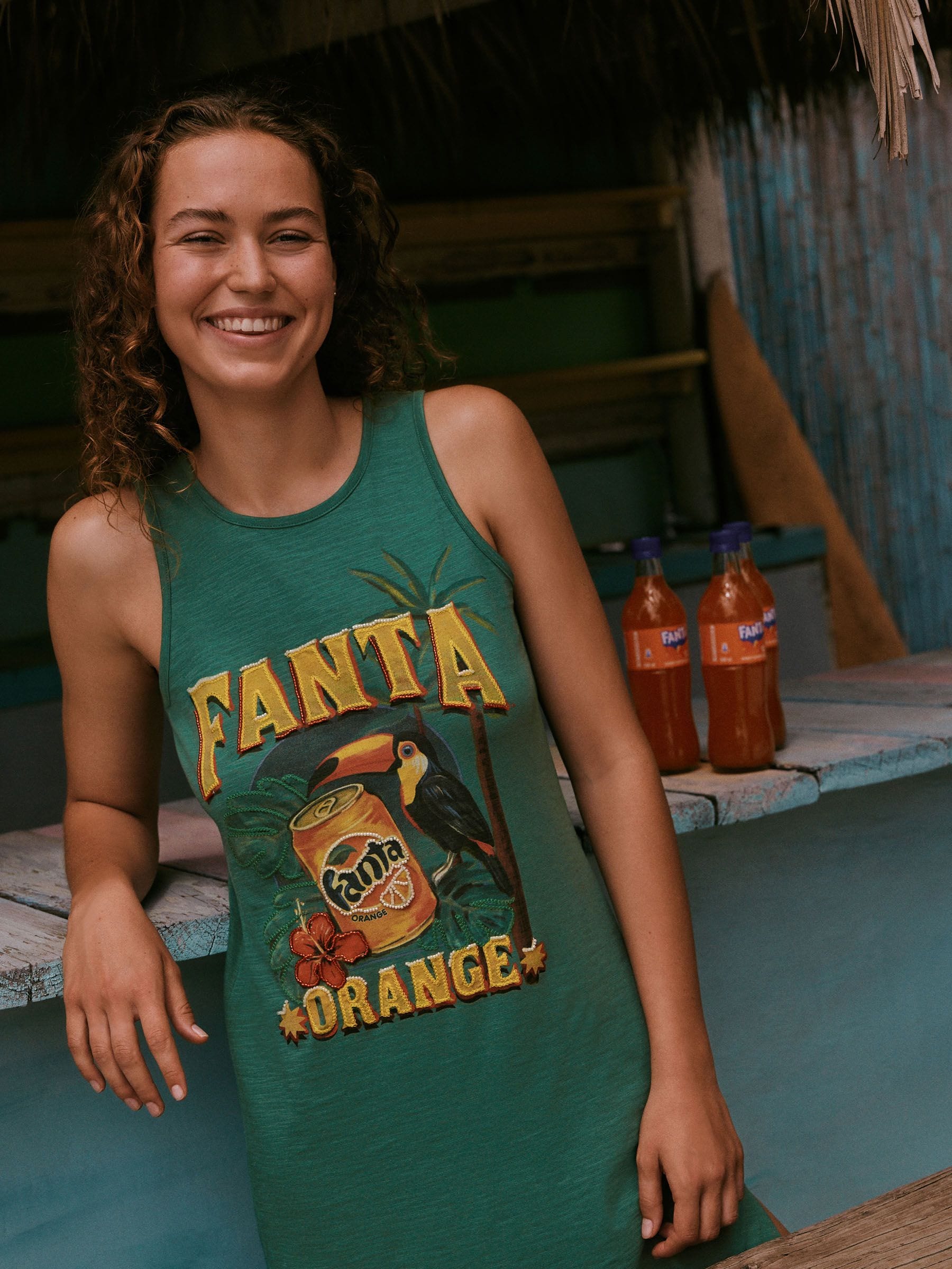 Buy Green Fanta Graphic Sleeveless Jersey Midi Dress from Next USA