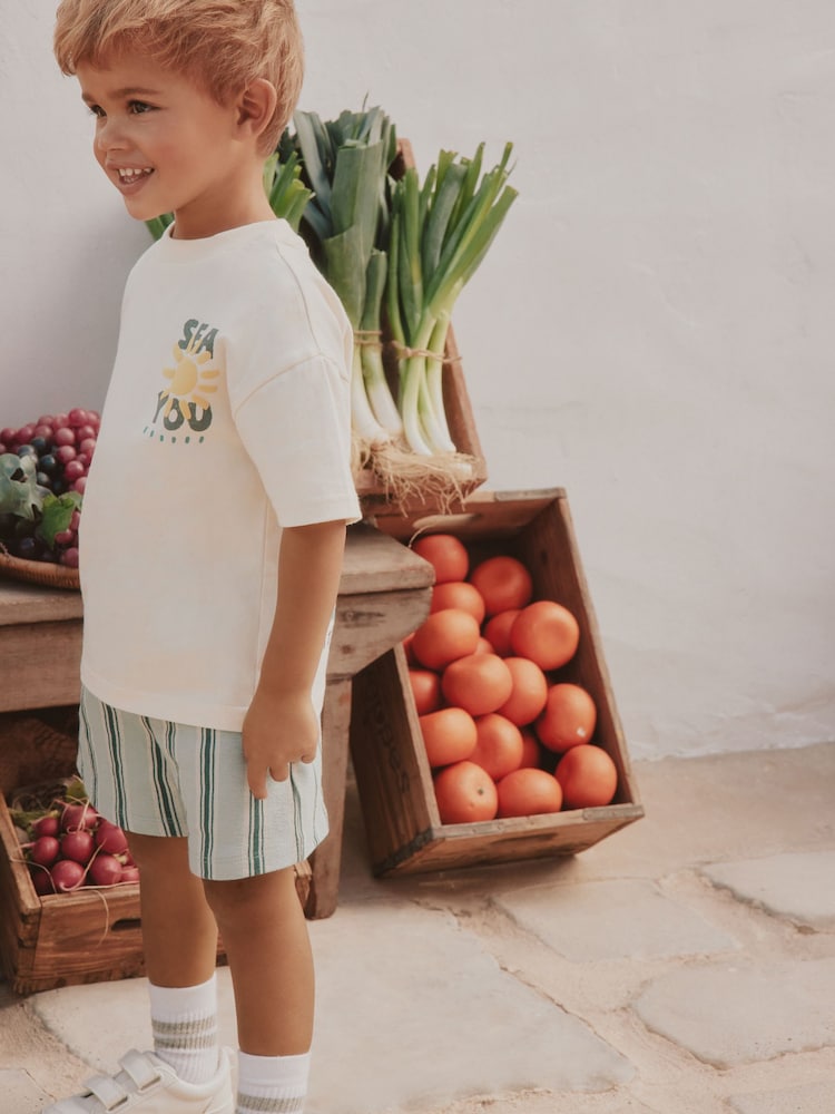 Barva Ecru Moře Na Pláži - Sada trička s krátkým rukávem a potiskem na zádech a šortek (3měsíců7let) - Obrázek 4 z 4 Barva Ecru Moře Na Pláži - Sada trička s krátkým rukávem a potiskem na zádech a šortek (3měsíců7let) - Obrázek 4 z 4