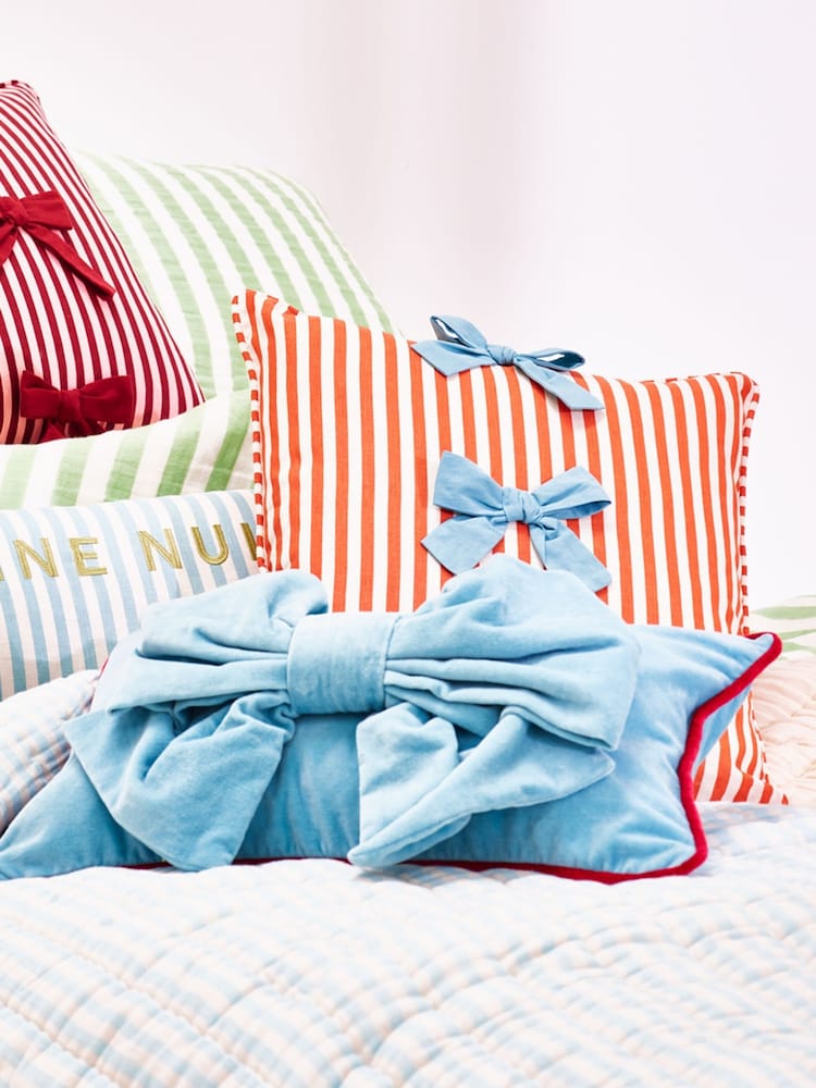 Oliver Bonas Blue Velvet Bow Cushion Cover 30x50cm - Image 1 of 5