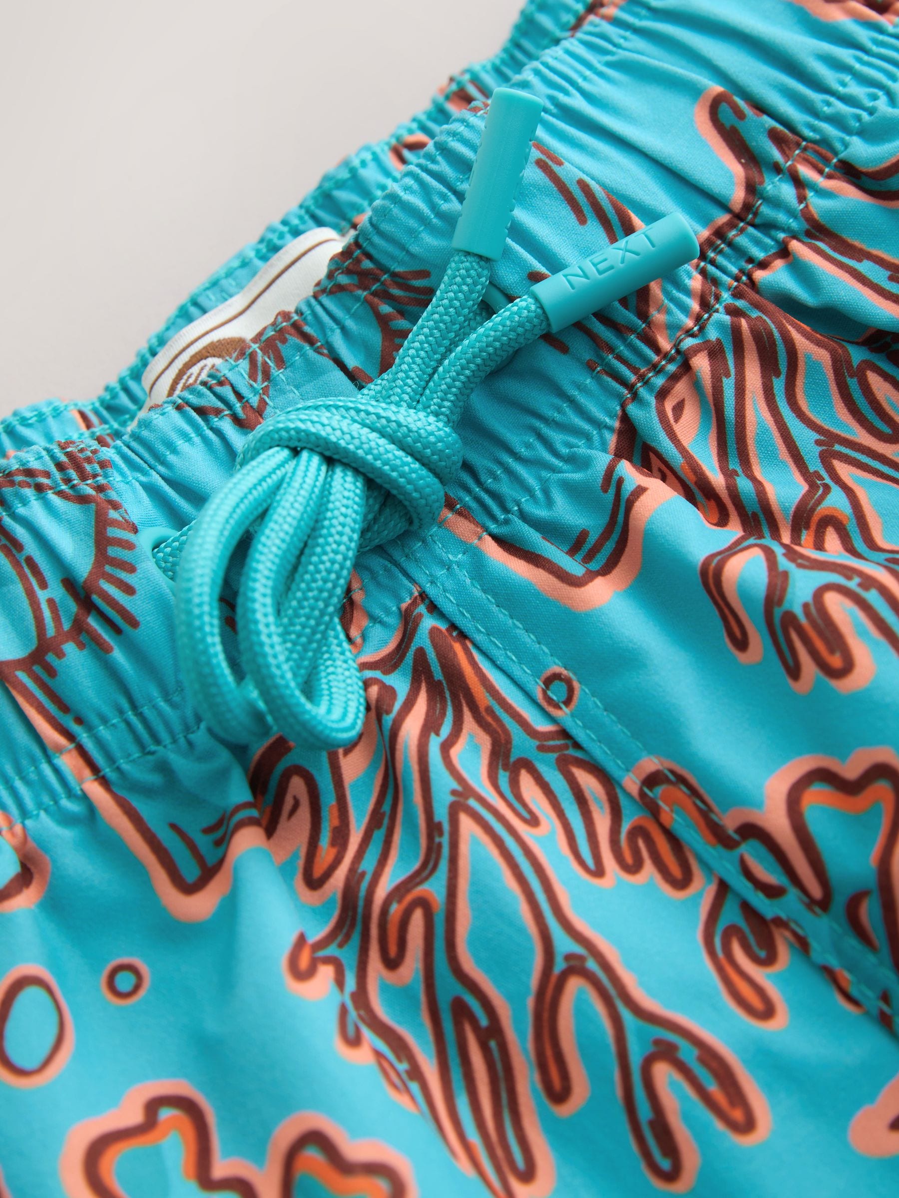 Buy Teal/Orange Coral Print Swim Shorts 5 Inch from Next USA