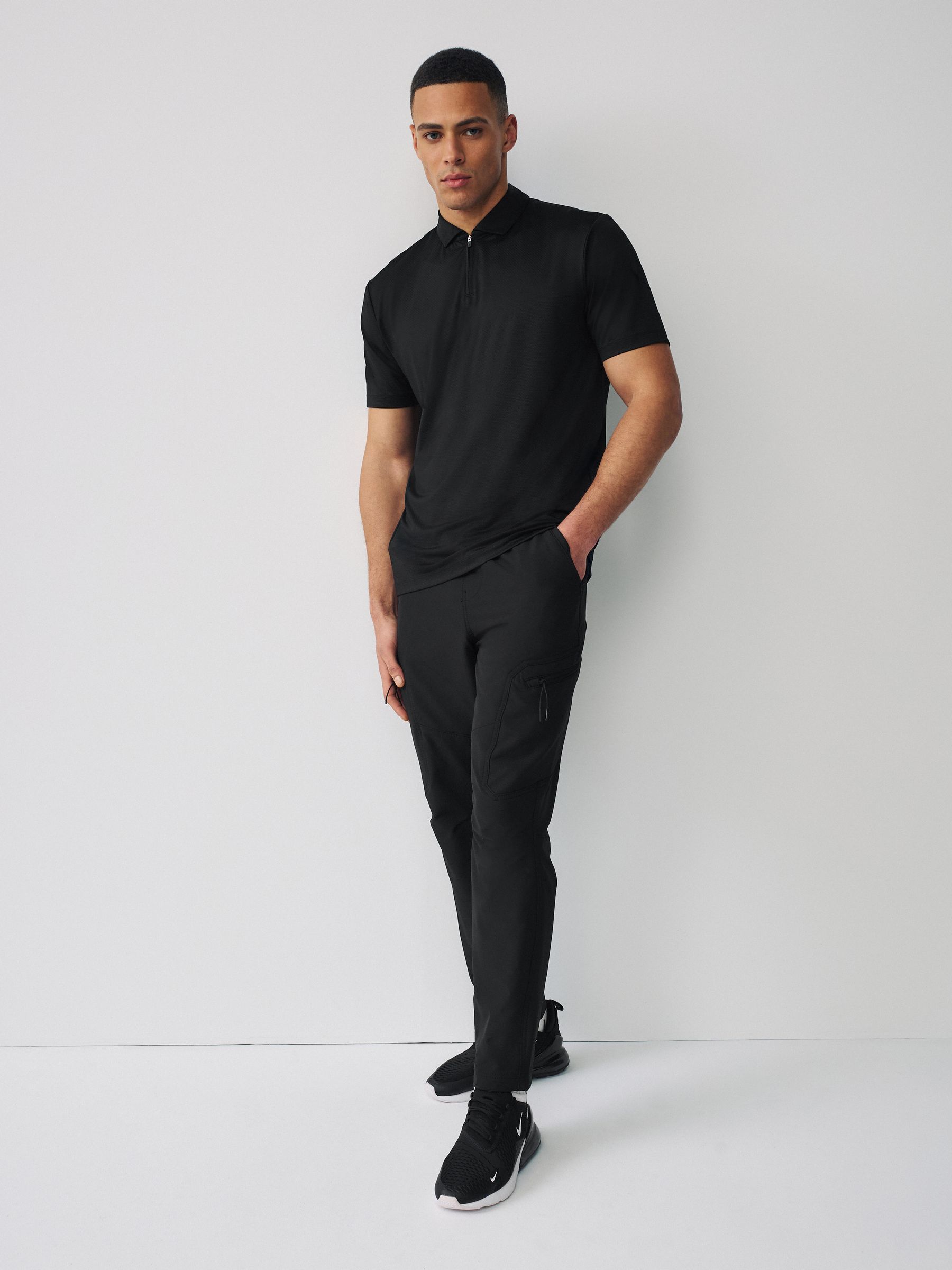 Buy Black Active Golf Textured Training Polo Shirt from Next USA
