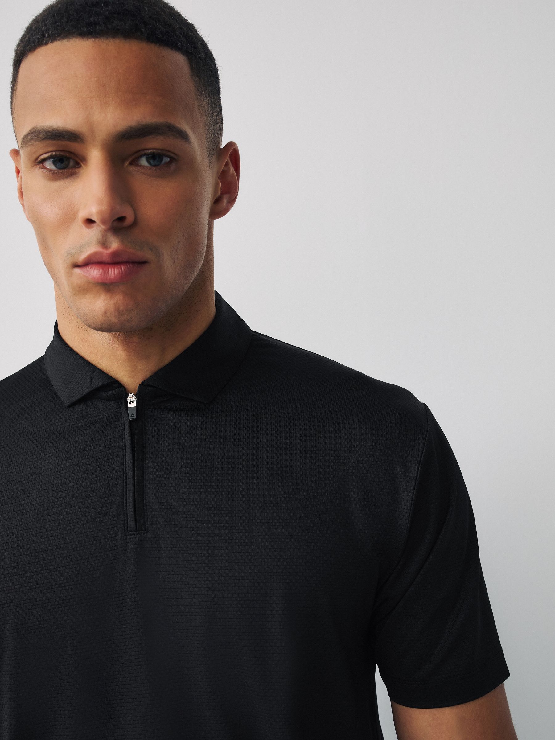Buy Black Active Golf Textured Training Polo Shirt from Next USA