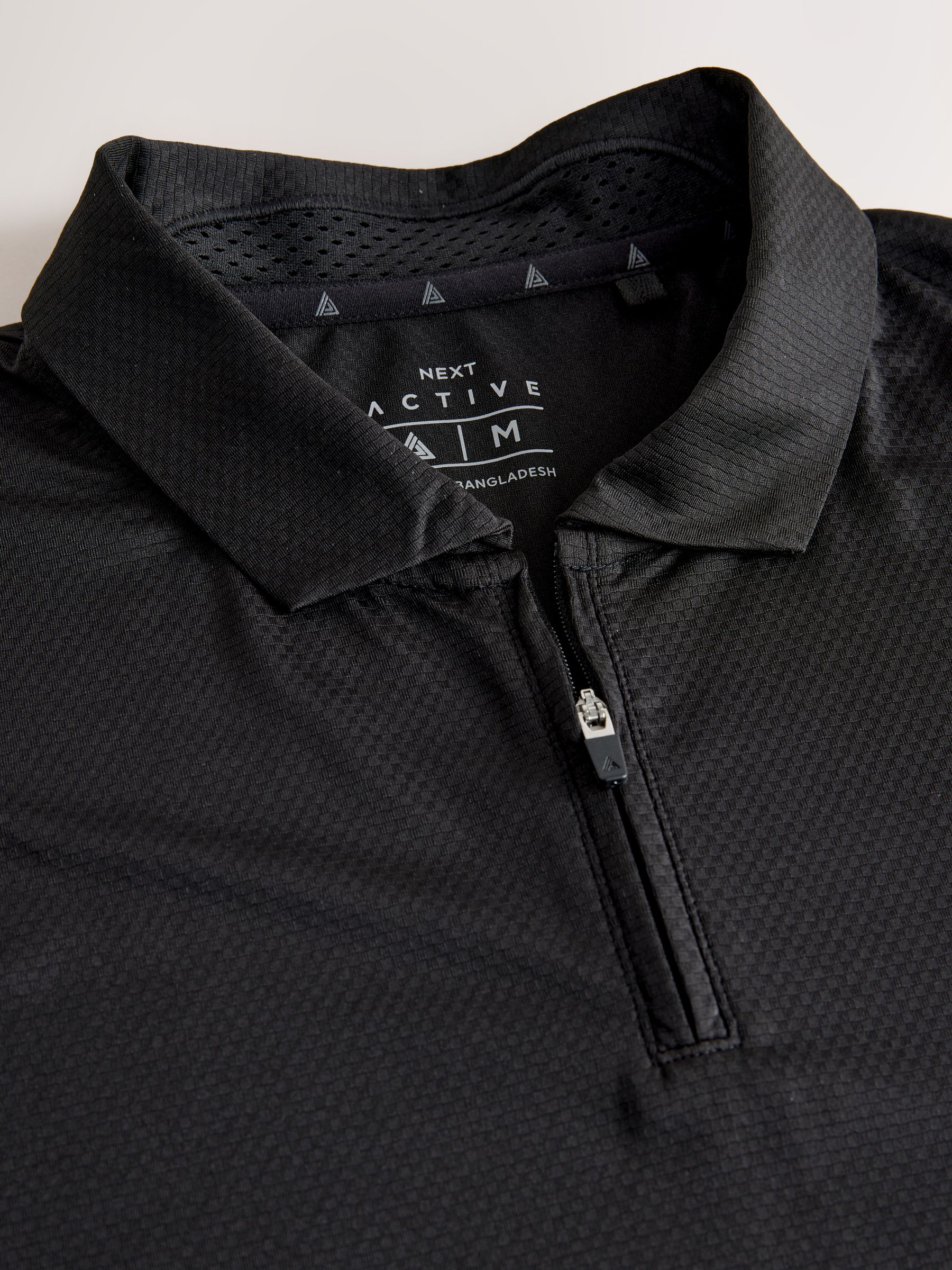 Buy Black Active Golf Textured Training Polo Shirt from Next USA