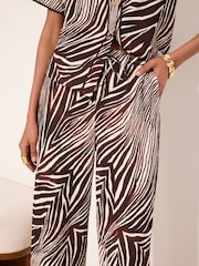 Lipsy Chocolate Brown Zebra Print Crinkle Wide Leg Trousers - Image 3 of 4
