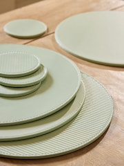 Set of 4 Sage Green Texture Reversible Faux Leather Placemats and Coasters - Image 2 of 3
