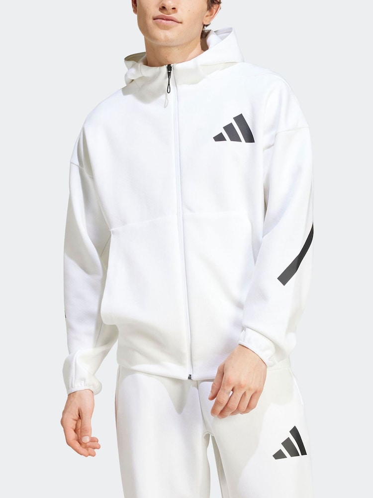 تشكيلة Z.N.E من adidas سترة رياضية بهودي وسحاب كامل - صورة 2 من 8