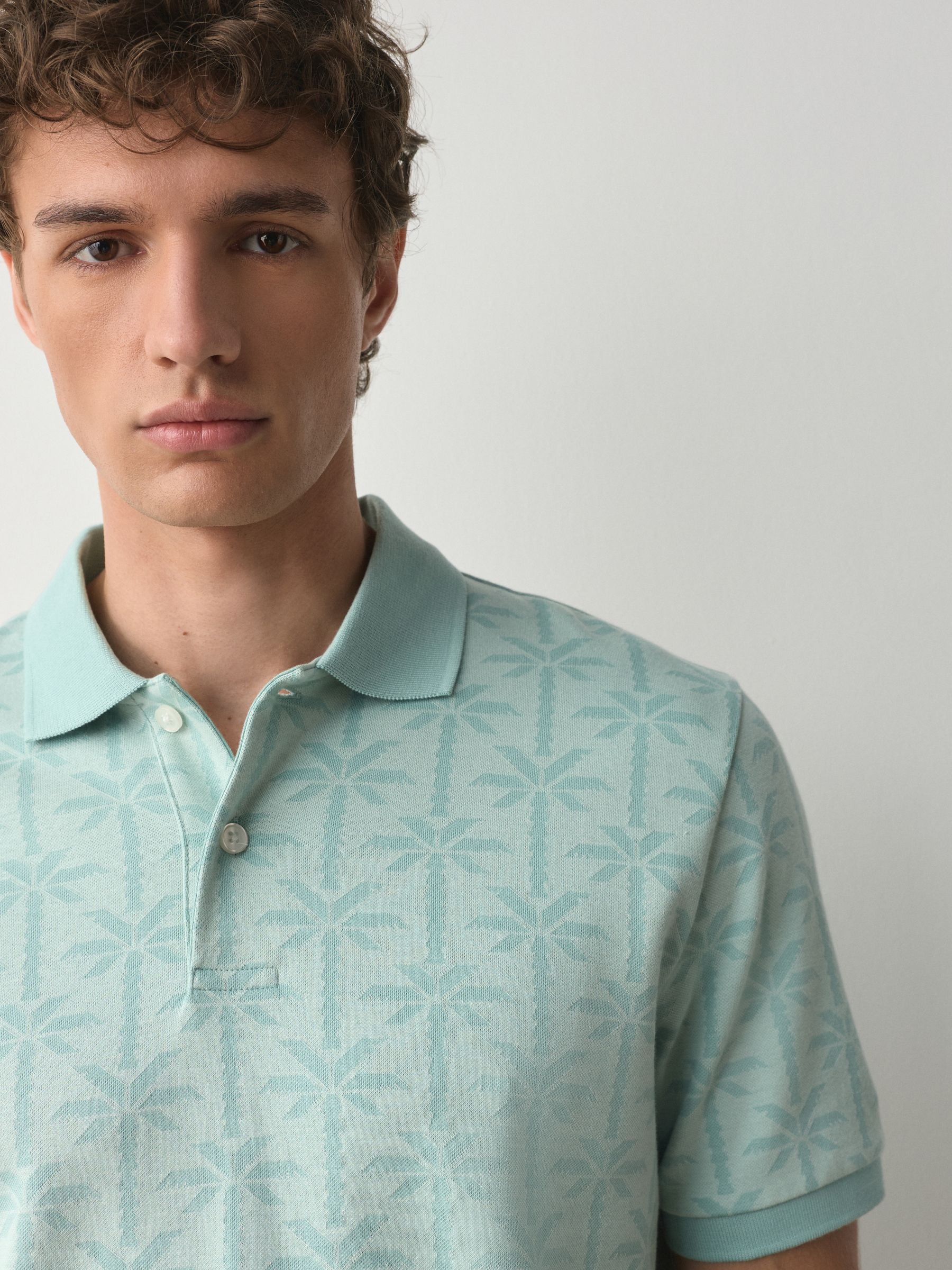 Buy Aqua Blue Short Sleeve Jacquard Pattern Polo Shirt from Next USA