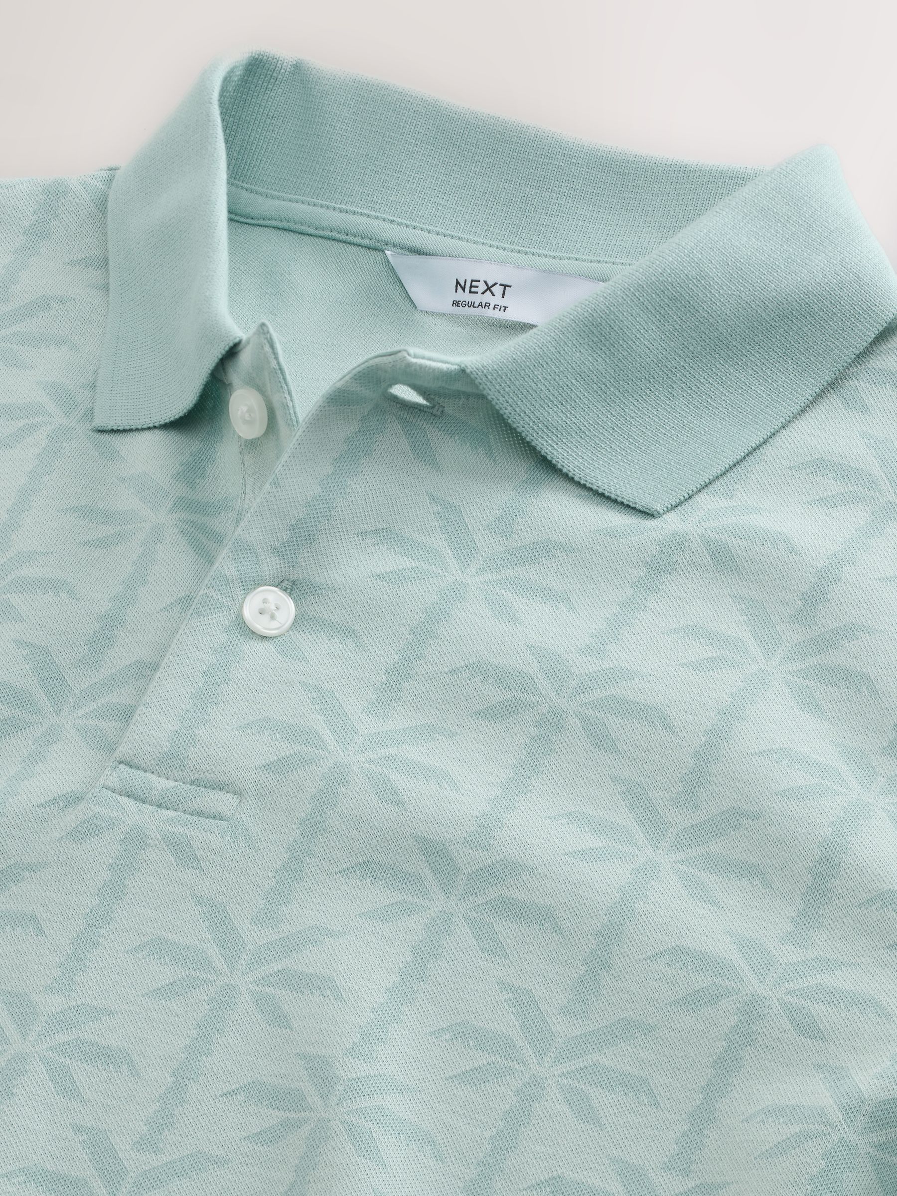 Buy Aqua Blue Short Sleeve Jacquard Pattern Polo Shirt from Next USA