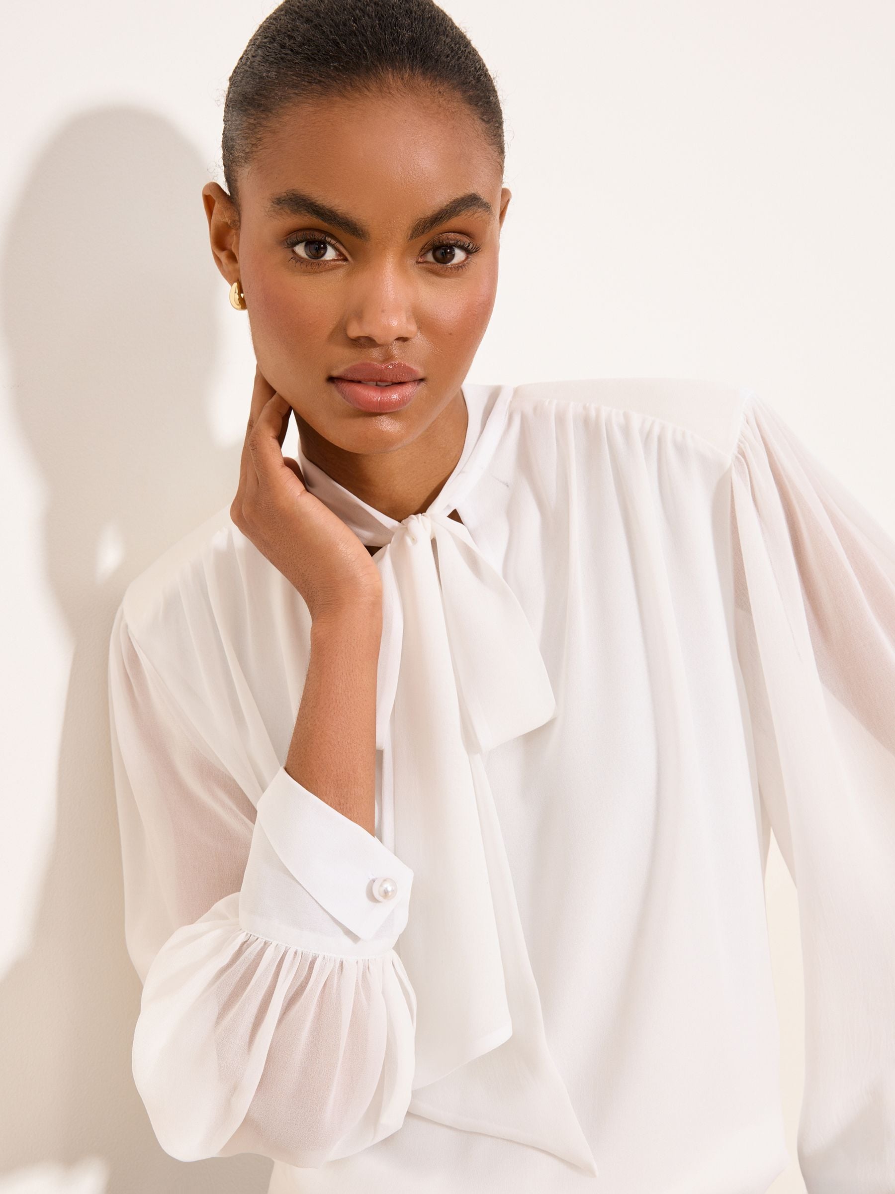 Buy Lipsy White Chiffon Pussybow Shoulder Pad Blouse from Next