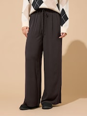 M&Co Brown Petite Acid Wash Wide Leg Trousers - Image 1 of 6