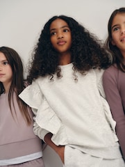 The Set 6 Piece Frill Crew Neck Long Sleeve Peplum Rib Flare Balloon Leg and Wide Leg T-Shirt and Joggers Set Purple/Lilac/Grey Marl - Image 9 of 18