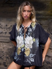 Religion Black Taylor Loose Blouse With Floral Placement Print And Neck Tie With Skull Charms - Image 1 of 4