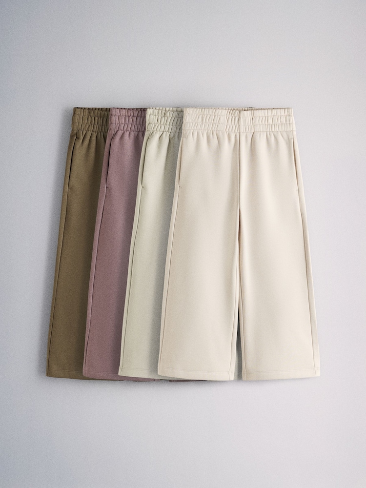 The Set 4 Pack Wide Leg Joggers Dark Green/Light Green/Purple/Light Brown - Image 1 of 7