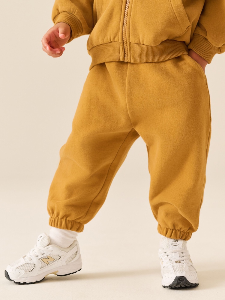 Ochre Yellow Regular Fit Soft Touch Jersey Joggers (3mths-7yrs) - Image 1 of 5 Ochre Yellow Regular Fit Soft Touch Jersey Joggers (3mths-7yrs) - Image 1 of 5