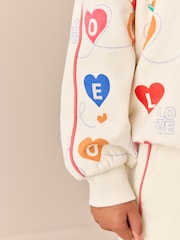 Rainbow Love Print - حزمة من 2 قطعة تتألف من سترة وبنطلونات رياضية من Little Bird - صورة 6 من 13