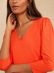 Love & Roses Orange 3/4 Sleeve Scallop V-Neck Jersey Top - Image 2 of 4