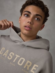 صخري - هودي ثقيل الوزن من القطن بشعار كبير الحجم من Castore - صورة 4 من 7