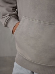 صخري - هودي ثقيل الوزن من القطن بشعار كبير الحجم من Castore - صورة 6 من 7