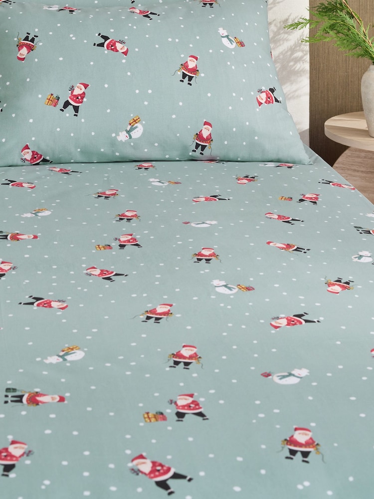 Green Santa Christmas Fitted Sheet and Pillowcase Set - Image 1 of 2 Green Santa Christmas Fitted Sheet and Pillowcase Set - Image 1 of 2