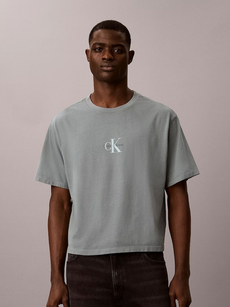Calvin Klein Blue Relaxed Monogram T-Shirt - Image 1 of 6 Calvin Klein Blue Relaxed Monogram T-Shirt - Image 1 of 6