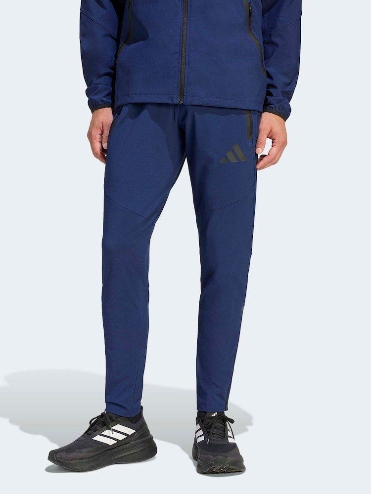 adidas Blue Tiro Travel Woven Tracksuit Bottoms - Image 1 of 6